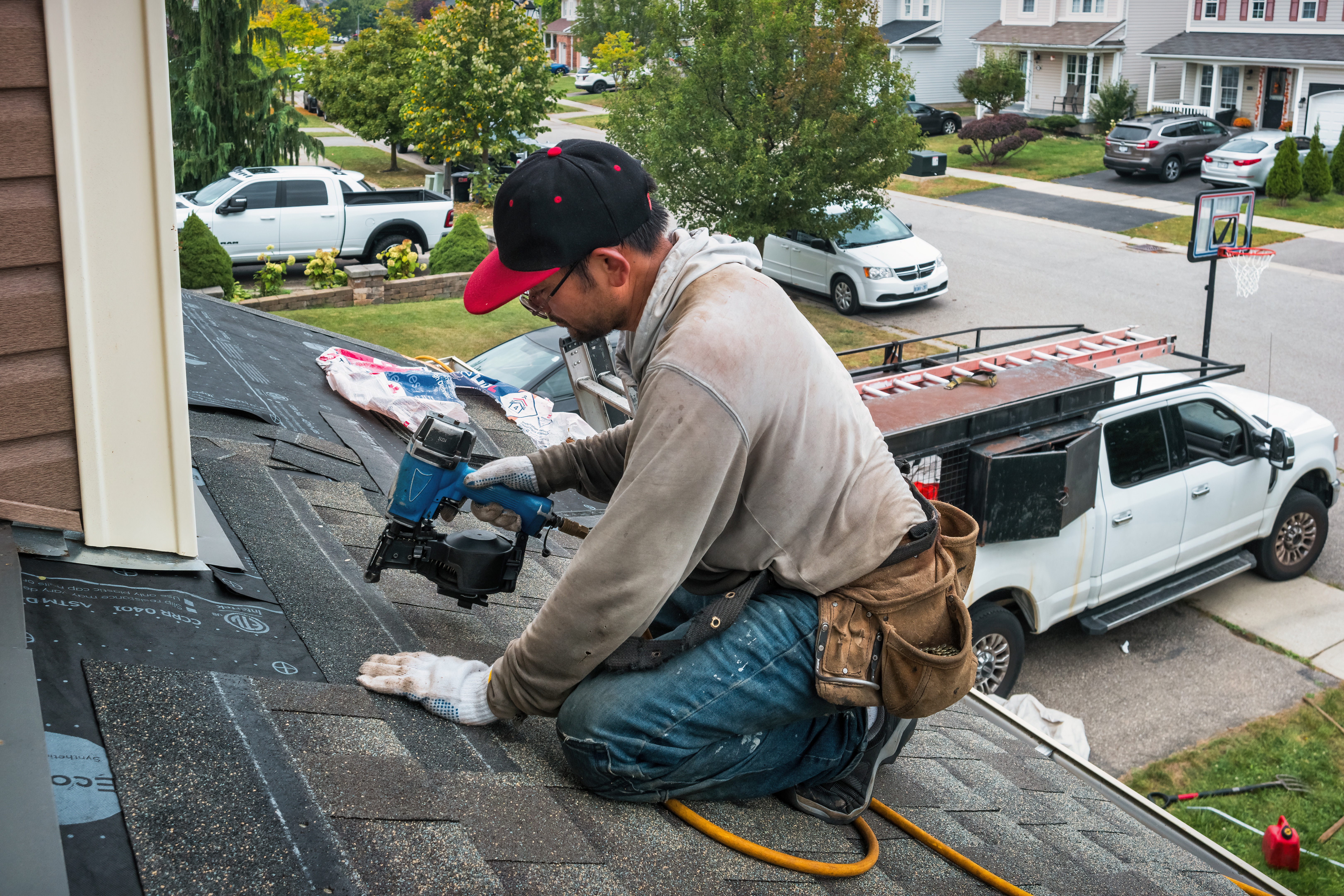 Roofer repairing a roof